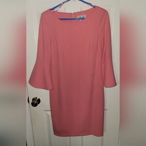 Jessica H, Size 10, coral colored dress, with goal zipper down the back